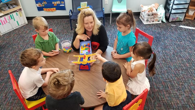 teacher with children